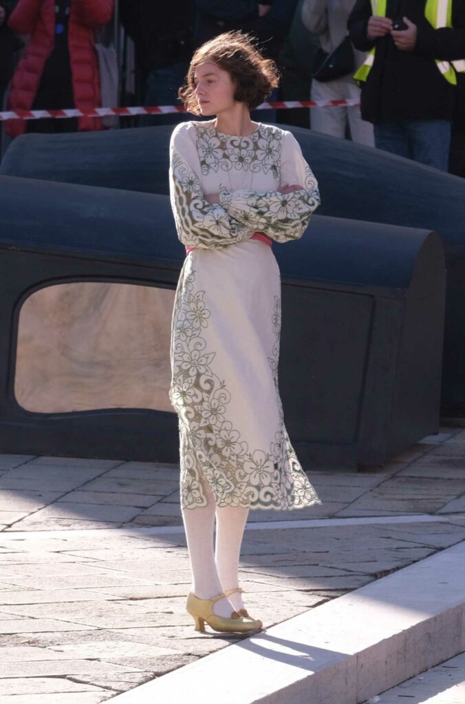 Emma Corrin in a Floral Dress