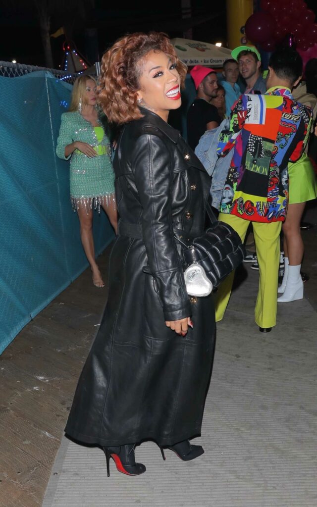 Keyshia Cole in a Black Leather Coat