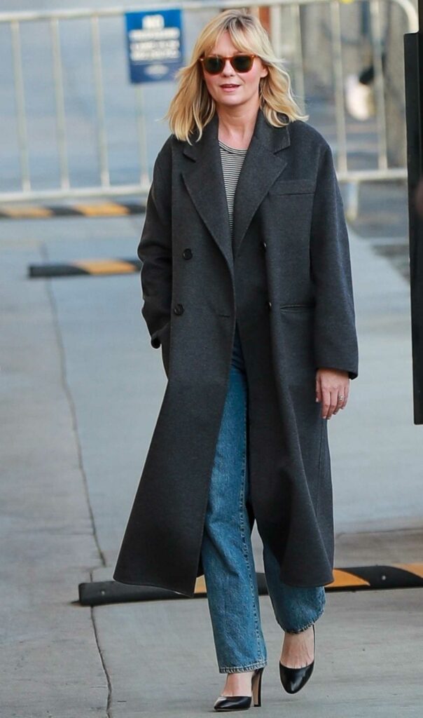 Kirsten Dunst in a Black Coat