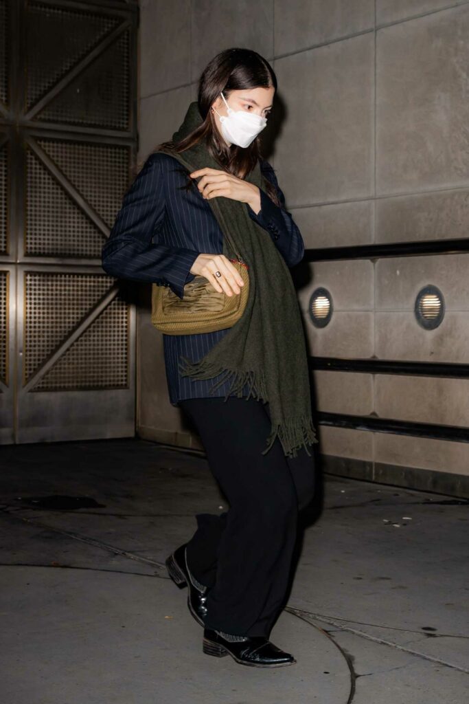 Lorde in a Protective Mask