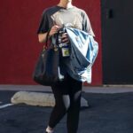 Mia Goth in a Grey Tee Arrives at the Gym in Los Angeles