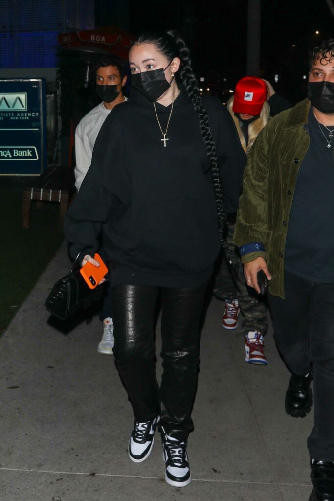 Noah Cyrus in a Black Hoodie