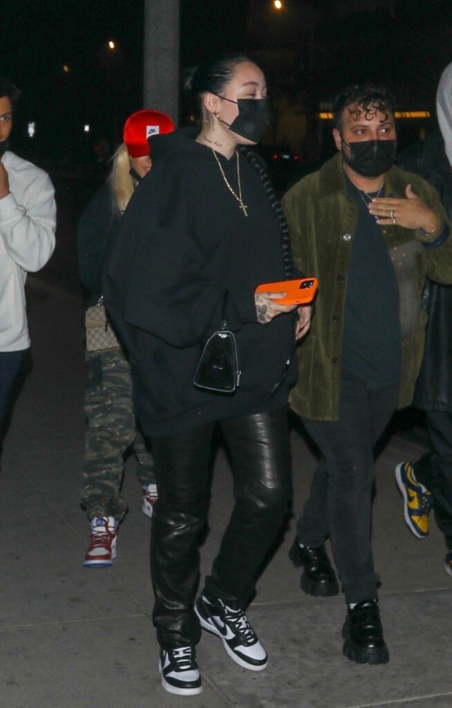 Noah Cyrus in a Black Hoodie