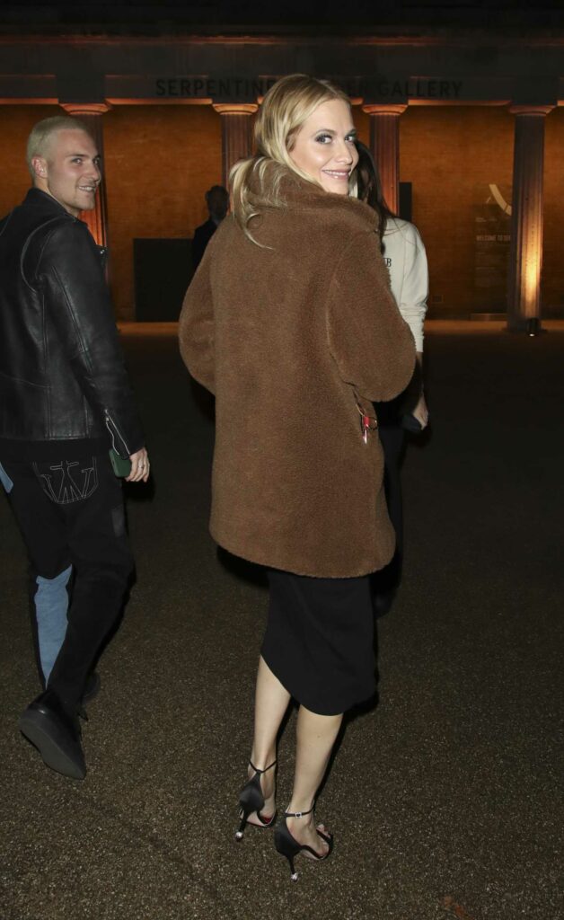 Poppy Delevingne in a Brown Fur Coat
