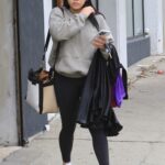 Suni Lee in a White Nike Sneakers Leaves the DWTS Studio in Los Angeles