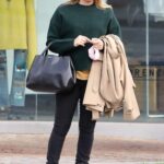 Alicia Silverstone in a Green Sweater Leaves a Hair Salon in West Hollywood