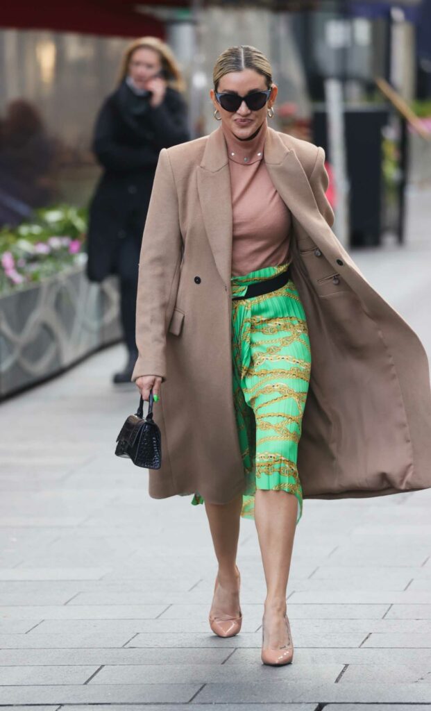 Ashley Roberts in a Festive Green Skirt