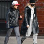 Cara Delevingne in a Black Beanie Hat Was Seen Out with a Friend in New York