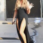 Chrissy Teigen in a Black Dress Arrives at the El Capitan Entertainment Centre in Hollywood