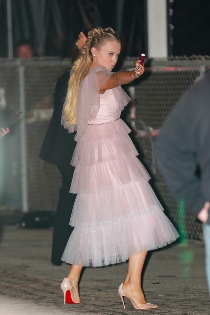JoJo Siwa in a Pink Dress