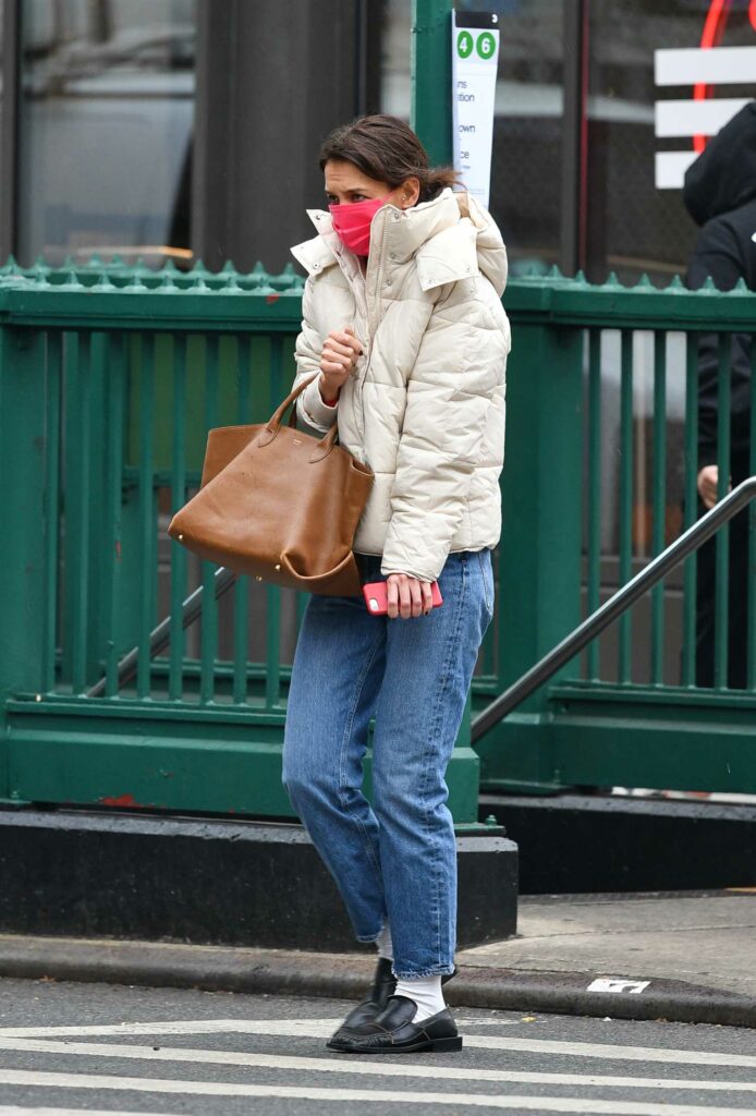 Katie Holmes in a Red Protective Mask