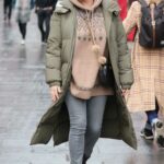 Kelly Brook in an Olive Puffer Coat Leaves the Heart Radio in London