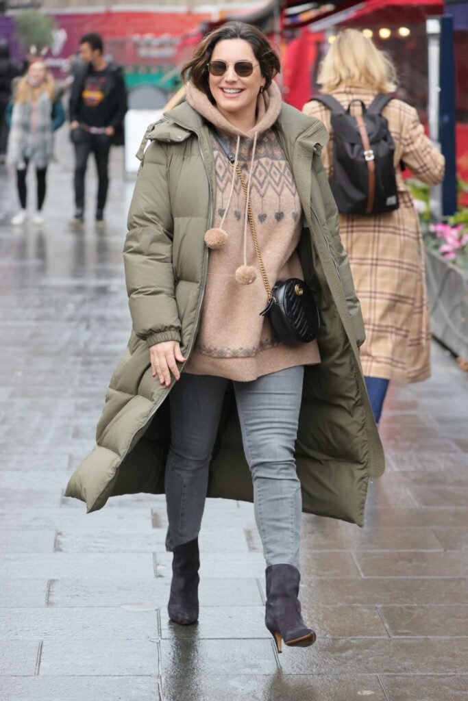 Kelly Brook in an Olive Puffer Coat