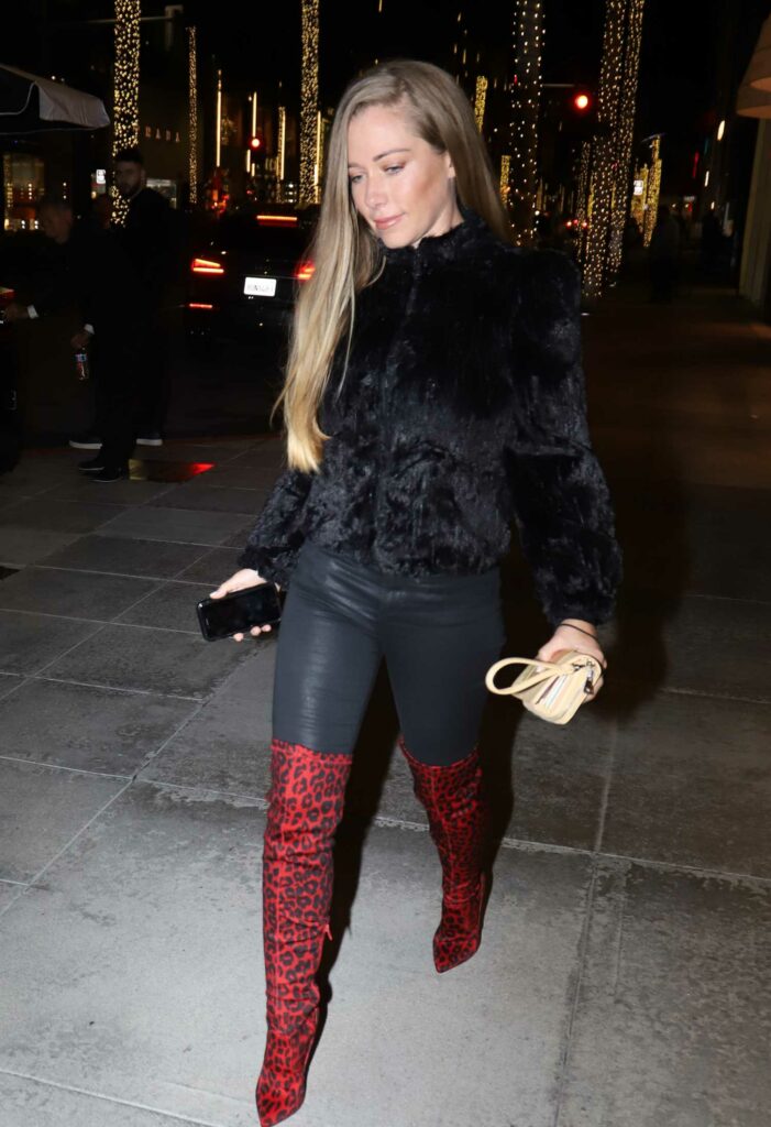 Kendra Wilkinson in a Red Animal Print Boots