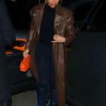 Lori Harvey in a Brown Leather Coat Steps Out to Dinner at Mastro’s Penthouse in Beverly Hills