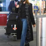 Penelope Cruz in a White Beanie Hat Arrives at JFK Airport in New York