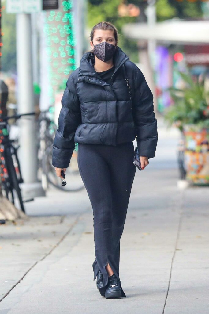 Sofia Richie in a Black Puffer Jacket