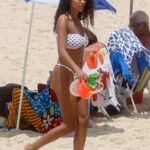 Tina Kunakey in a White Polka Dot Bikini on the Beach in Rio de Janeiro