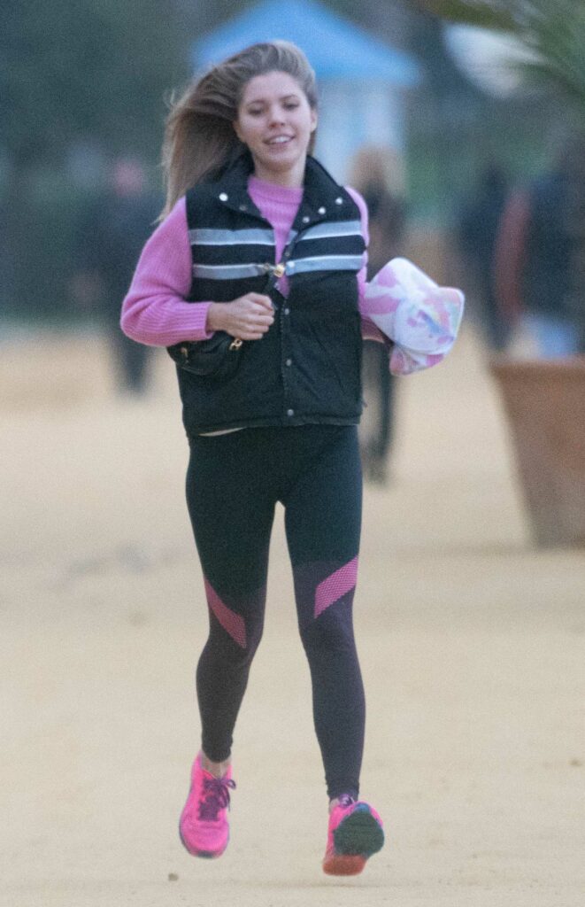 Victoria Swarovski in a Pink Sneakers