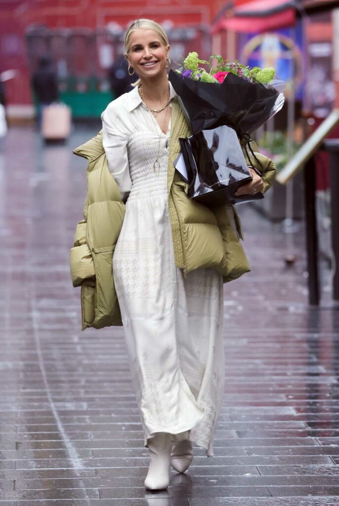 Vogue Williams in a Beige Dress