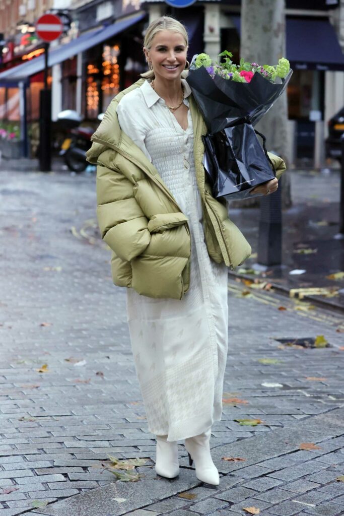 Vogue Williams in a Beige Dress