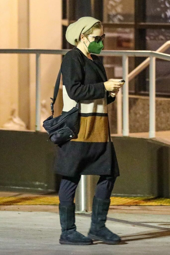Amy Adams in a Green Protective Mask