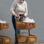 Brigitte Nielsen in a Beige Sweater Goes Shopping at Marshalls with Her Mother Hanne Nielsen in Los Angeles