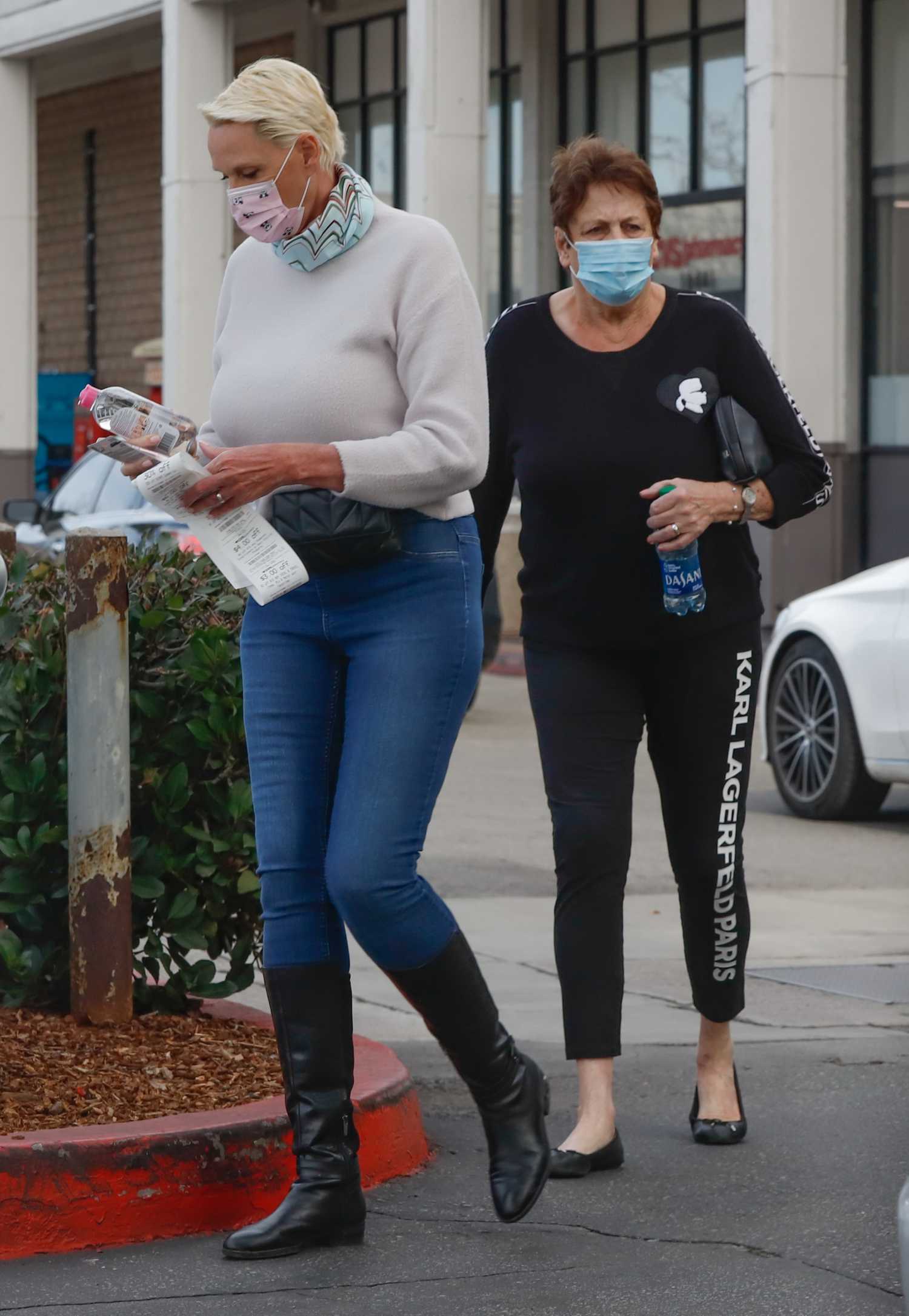 Brigitte Nielsen in a Beige Sweater Goes Shopping at Marshalls with Her
