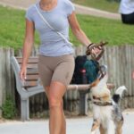 Brittany Hockley in a Grey Tee Walks Her Dog in Bondi