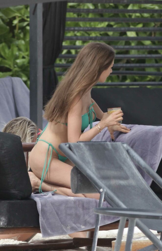 Camila Kendra in a Green Bikini