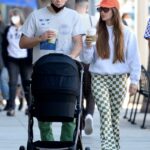 Clara Berry in a Red Cap Was Seen Out with KJ Apa and their Baby in Los Angeles