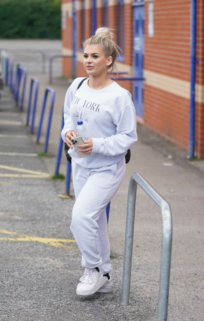 Liberty Poole in a White Sneakers