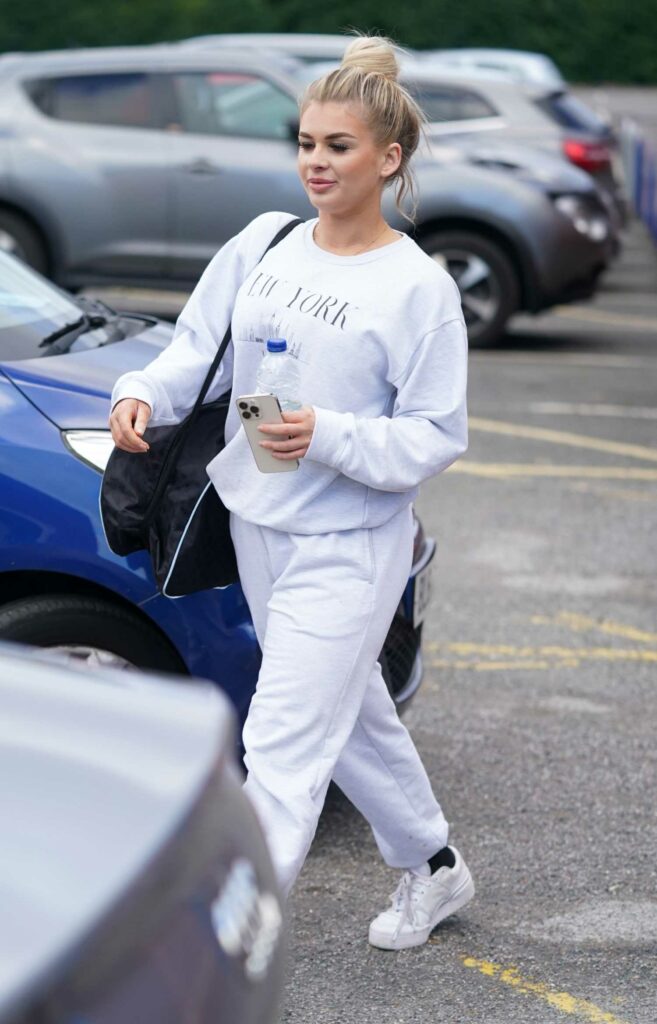 Liberty Poole in a White Sneakers