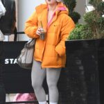 Maisie Smith in an Orange Puffer Jacket Was Seen Out in Birmingham