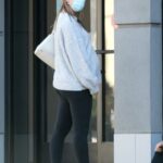 Mia Goth in a Grey Sweater Arrives at a Verizon Store in Pasadena