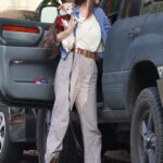 Scout Willis in a Blue Jacket Takes Her Dog Around Her Neighborhood in Los Feliz