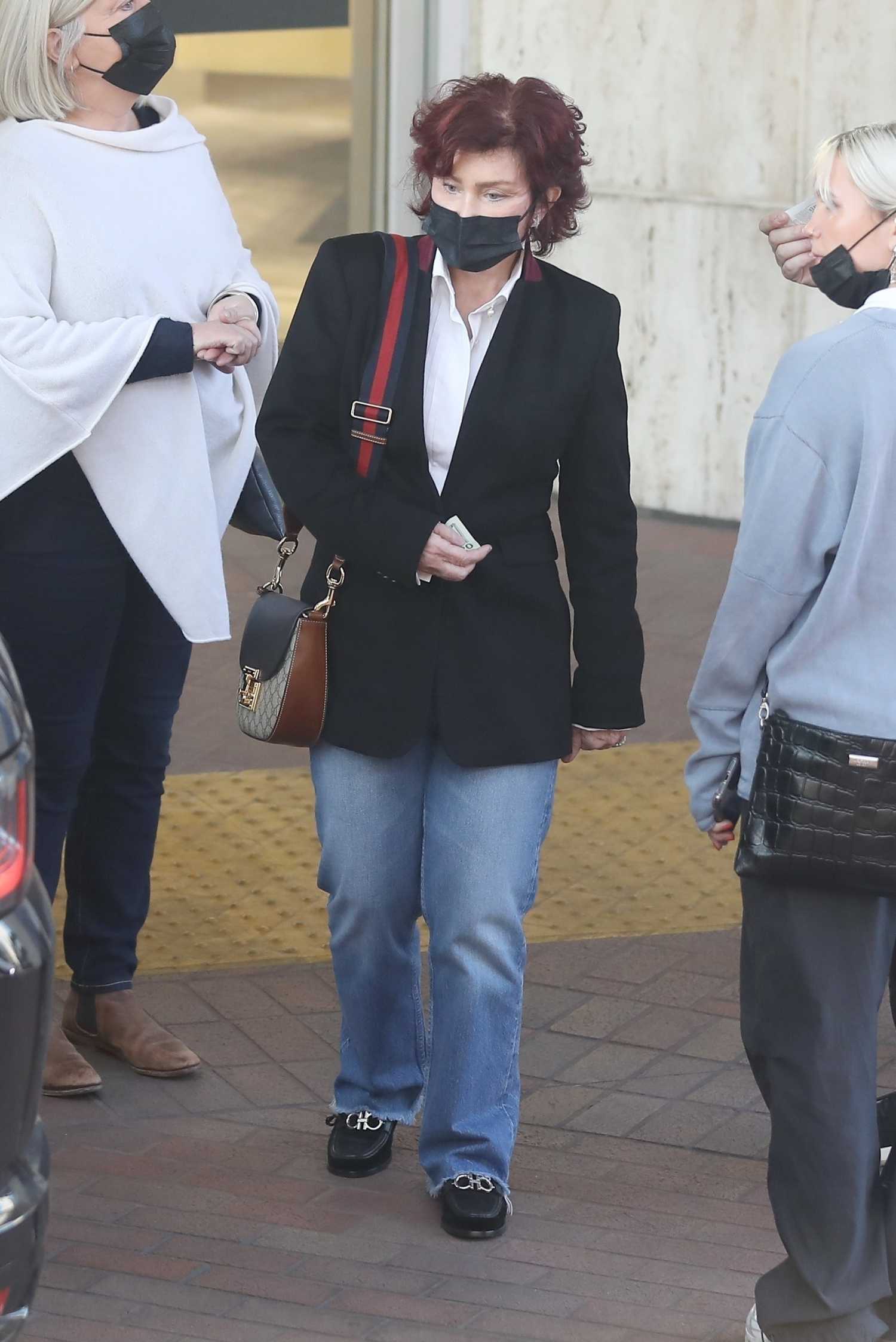 Sharon Osbourne in a Black Blazer Goes Shopping Alongside Family