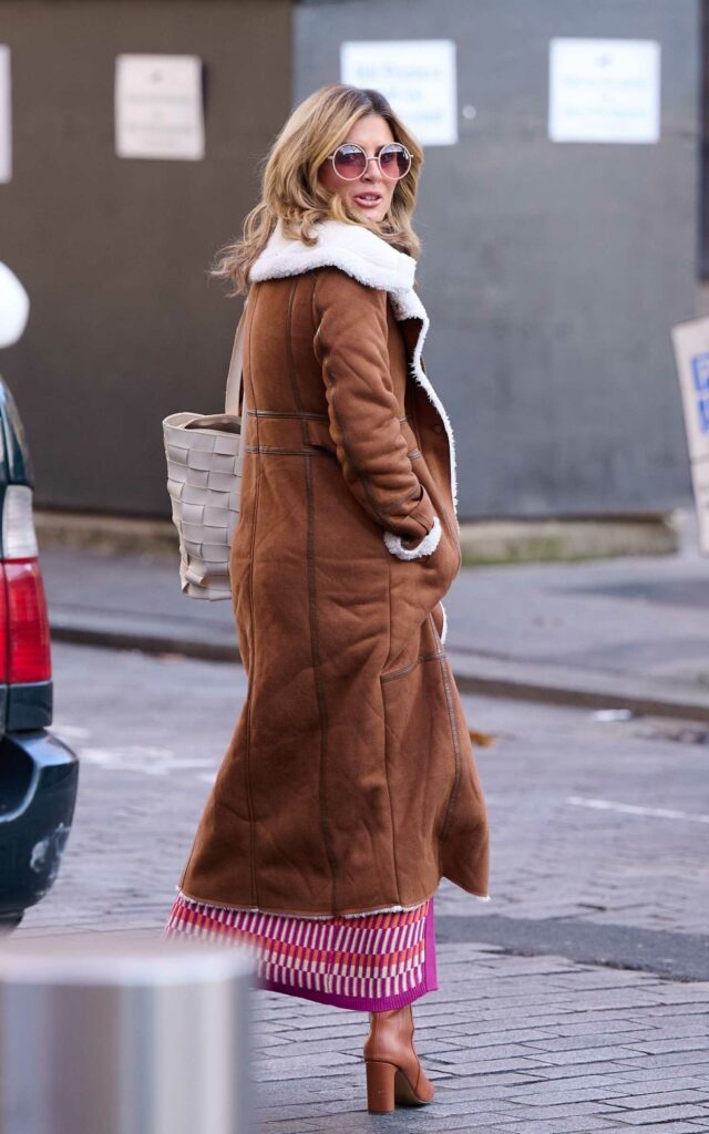 Zoe Hardman in a Tan Coat