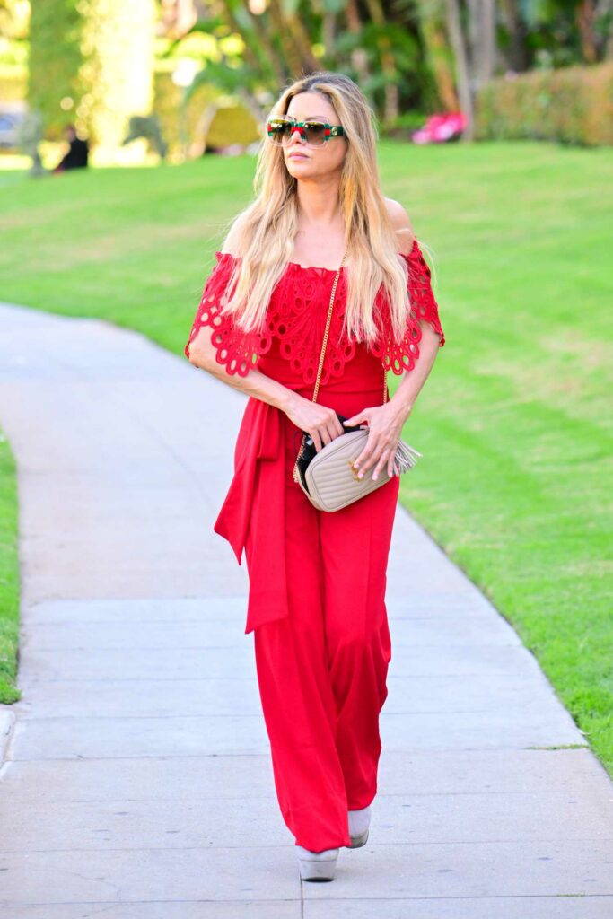 Adriana de Moura in a Red Outfit
