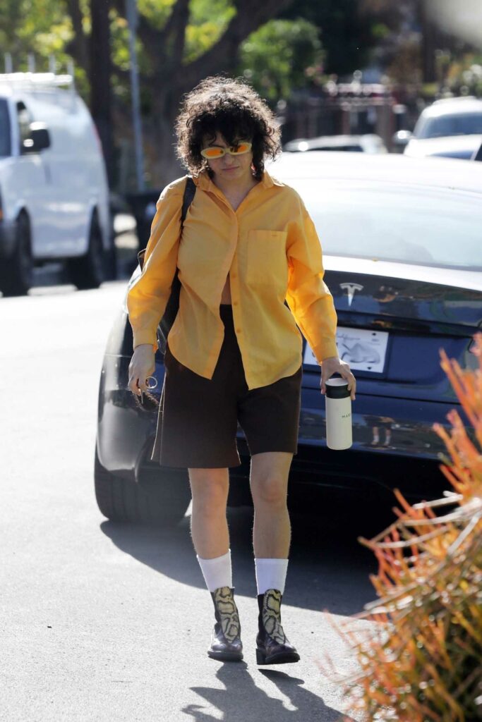 Alia Shawkat in a Yellow Shirt