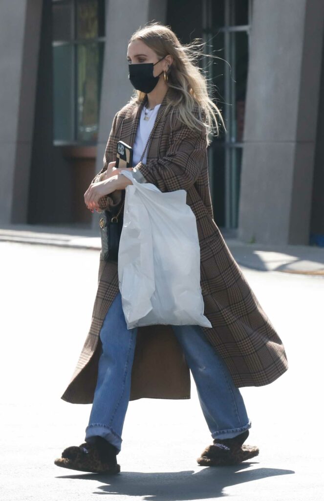 Ashlee Simpson in a Brown Plaid Coat