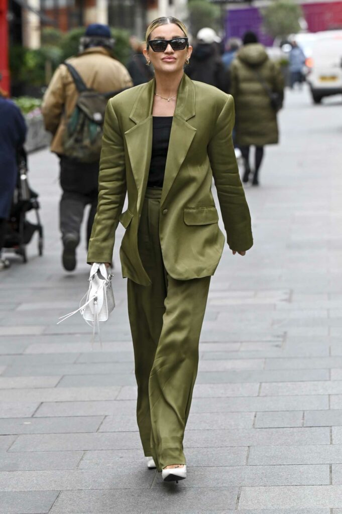 Ashley Roberts in a Green Pantsuit