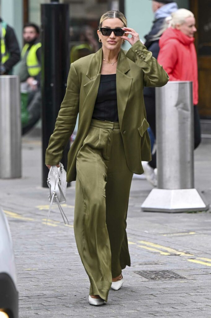 Ashley Roberts in a Green Pantsuit