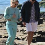 Braunwyn Windham-Burke in a Teal Ensemble Was Seen Out with Her Husband on the Beach in Newport Beach