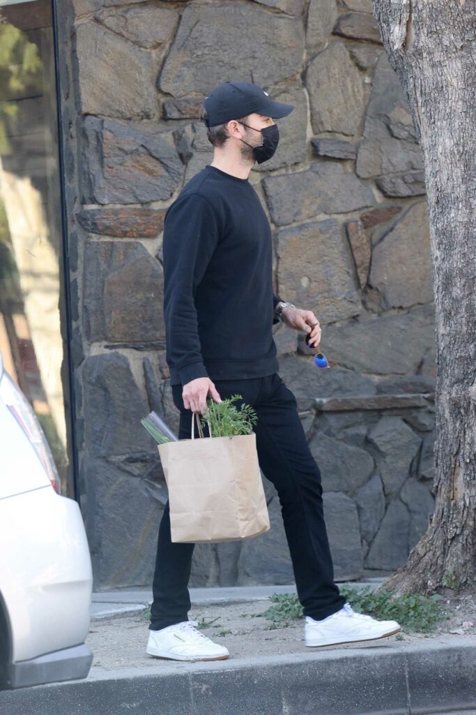 Chace Crawford in a Black Protective Mask
