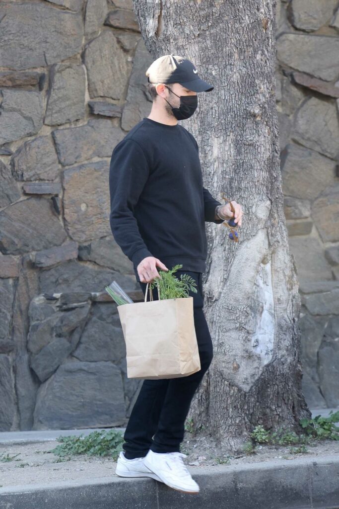 Chace Crawford in a Black Protective Mask