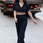 Charli XCX in a Black Ensemble Arrives at the Global Offices in London
