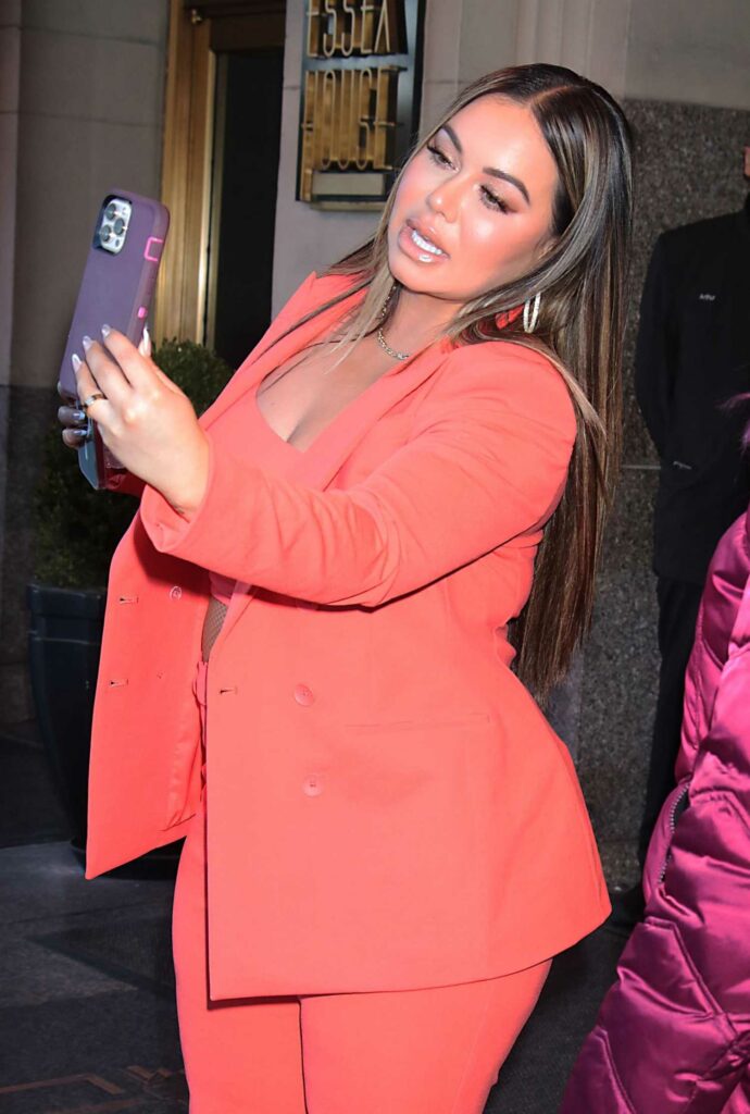 Chiquis Rivera in a Red Pantsuit