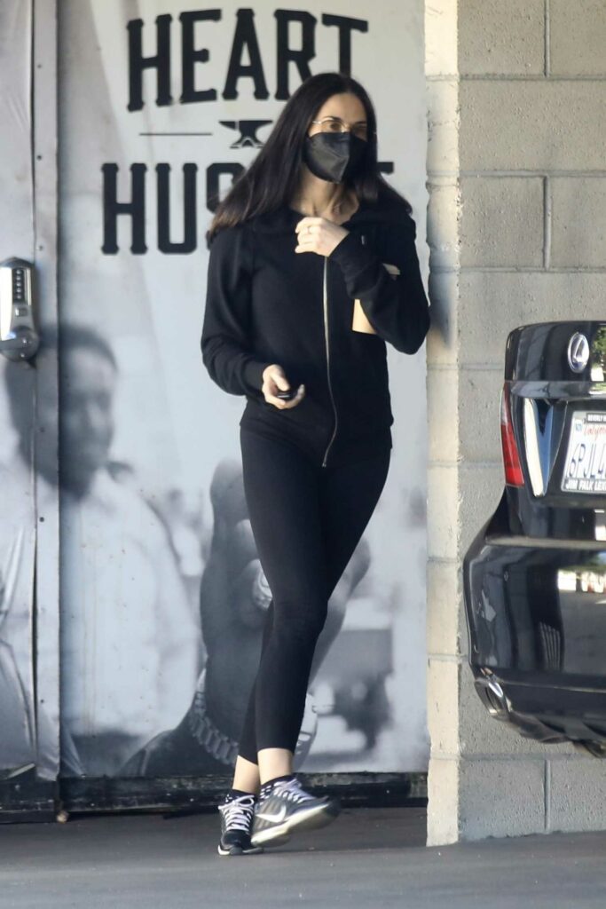 Demi Moore in a Black Protective Mask