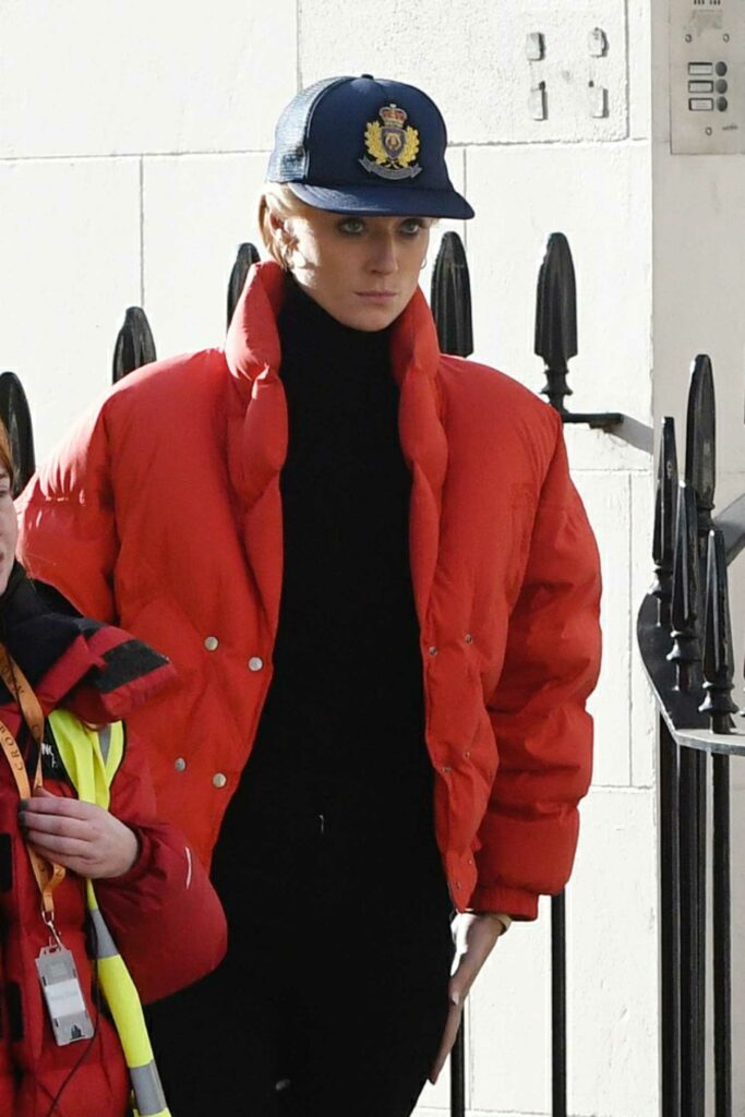 Elizabeth Debicki in a Red Puffer Jacket